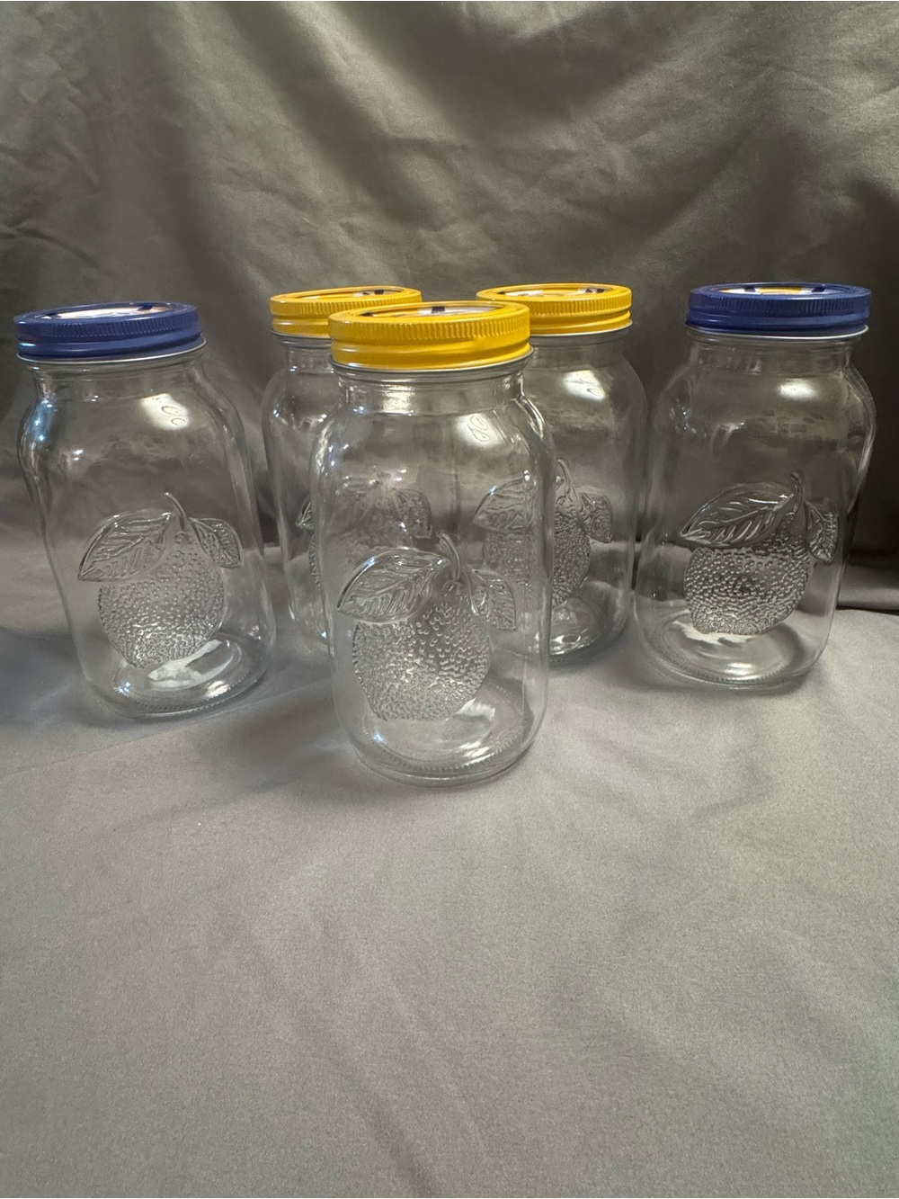 Clear Glass Fruit Embossed Storage Jars with Blue and Yellow Lids Set of 5-0088